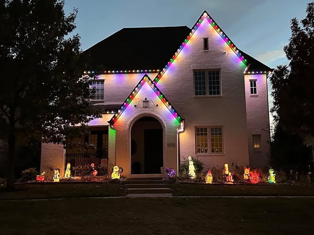 Vibrant party lighting on a Calgary home set with permanent LEDs for a celebration